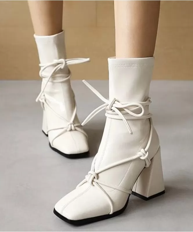 High tie up white boot