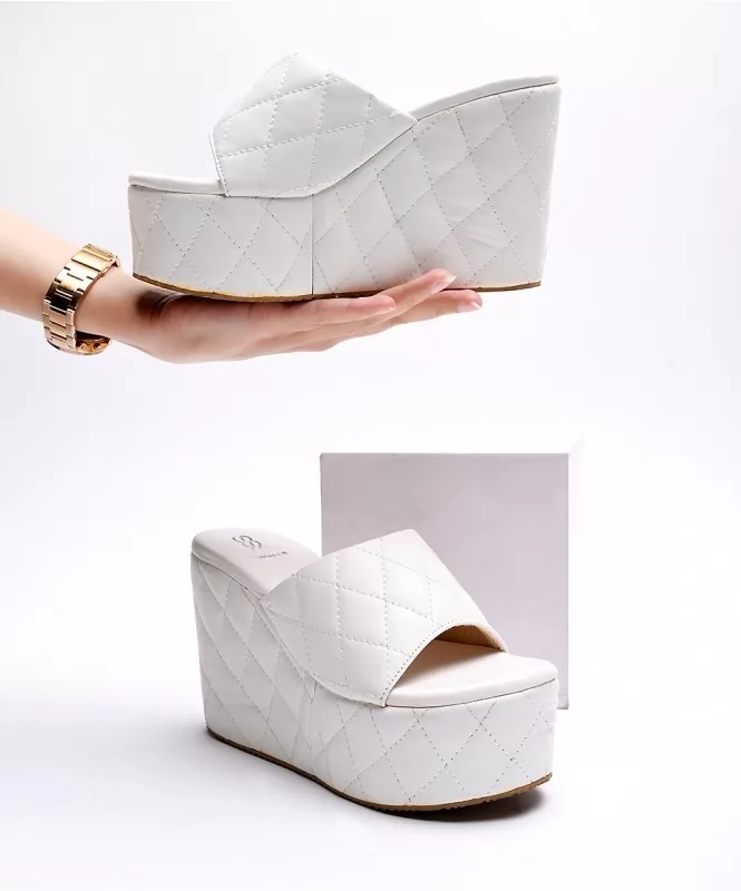 White diamond quilted wedges